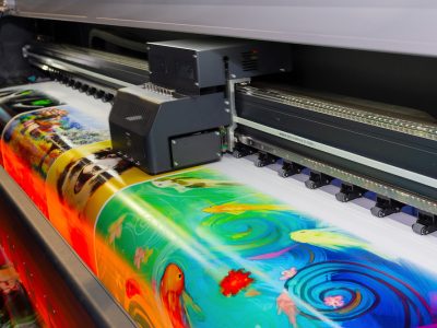 Large format printing machine in operation. Industry